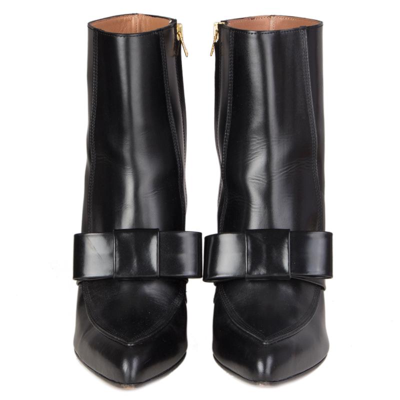 100% authentic Marni block-heel bow-strap ankle boots in black leather. Open with a zipper on the inside. Have been worn and are in virtually new condition. Come with dust bag.

Measurements
Imprinted Size	39
Shoe Size	39
Inside Sole	26cm