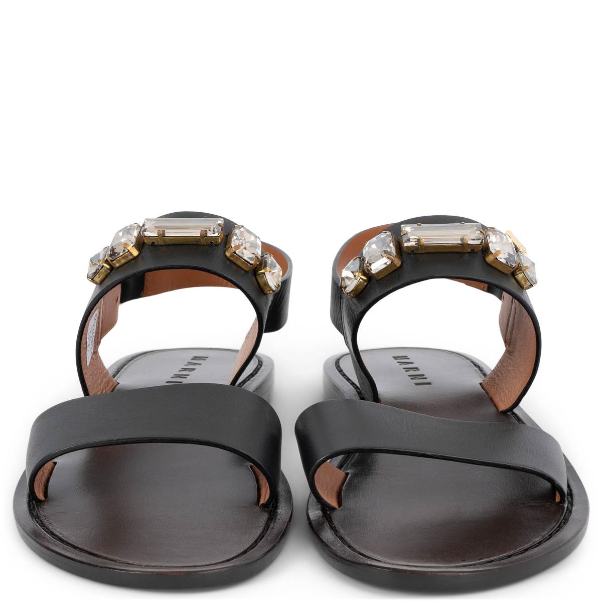 100% authentic Marni flats sandals in black & espresso brown leather embellished with clear crystals. Brand new. 

Measurements
Imprinted Size	39
Shoe Size	39
Inside Sole	26cm (10.1in)
Width	7.5cm (2.9in)
Hardware	Gold-Tone

All our listings include