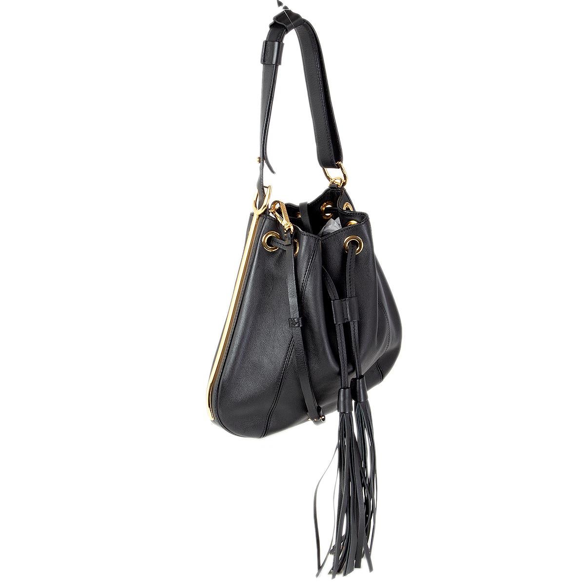 100% authentic Marni small tassel drawstring bucket bag in black calfskin featuring gold-tone hardware. Comes with an adjustable and detachable shoulder strap. Unlined. Has been carried and is in excellent condition. 

Measurements
Height	26cm