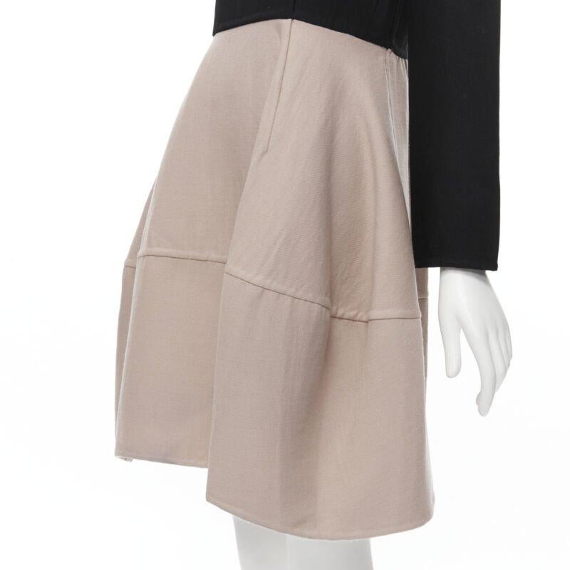 MARNI black nude wool crepe long sleeve bubble skirt fit flared dress IT38 XS
Reference: CELG/A00081
Brand: Marni
Material: Wool
Color: Black, Nude
Pattern: Solid
Closure: Zip
Made in: Italy

CONDITION:
Condition: Excellent, this item was pre-owned