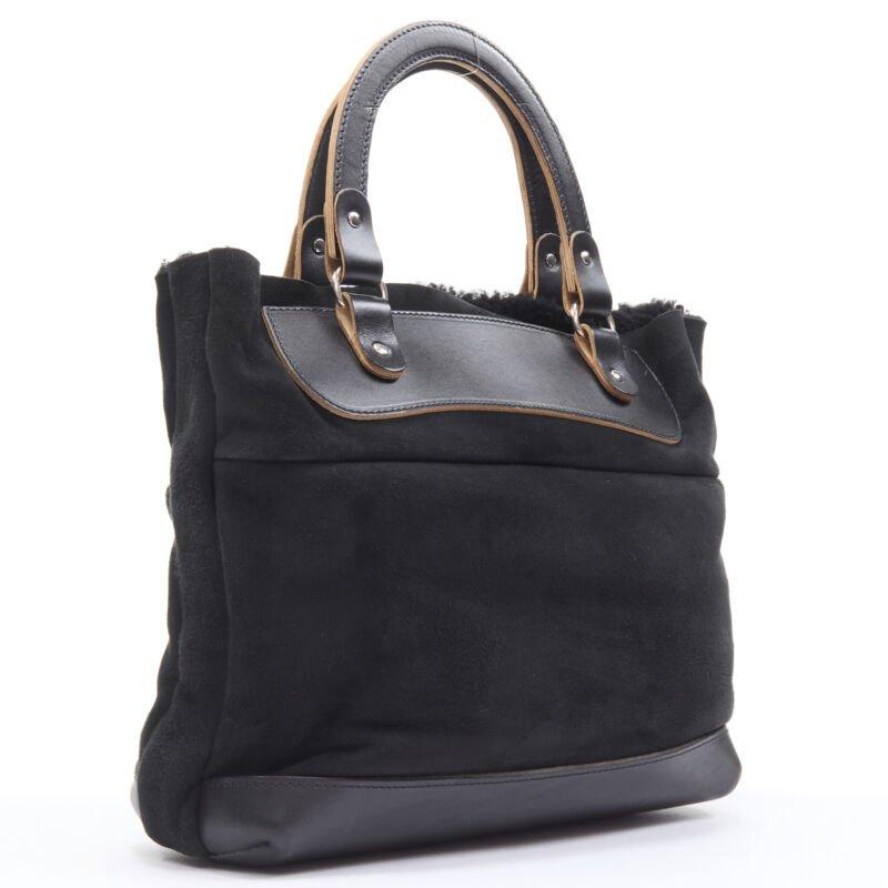 Nero MARNI borsa morbida con manico superiore foderata in shearling nero in vendita