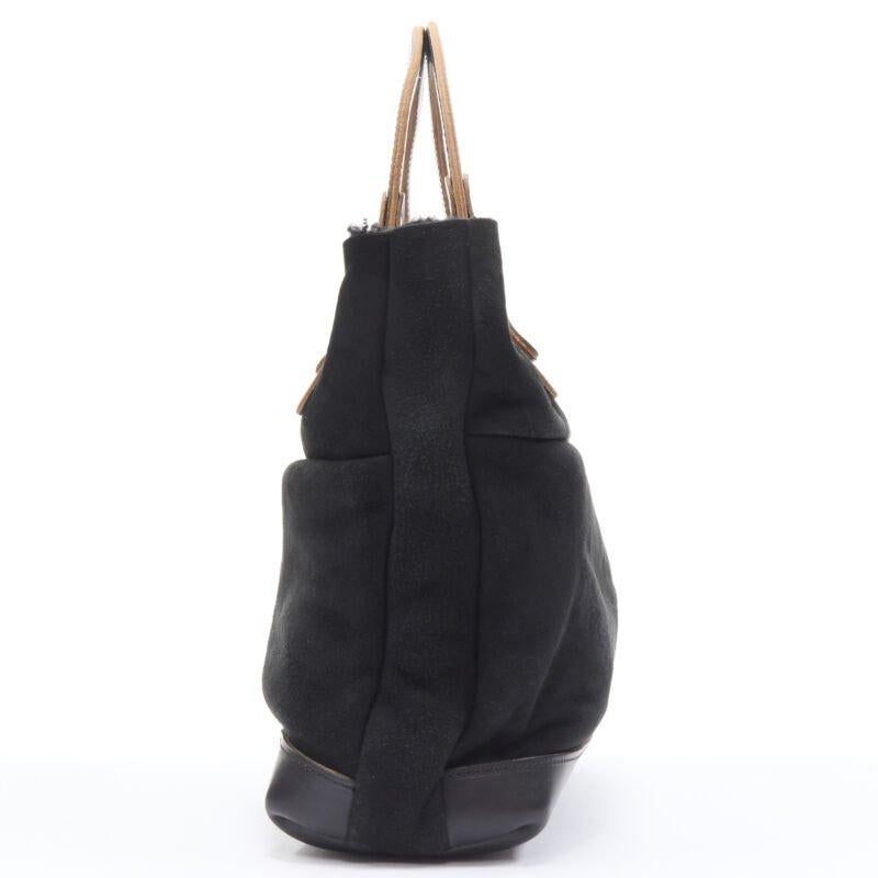 MARNI borsa morbida con manico superiore foderata in shearling nero In condizioni ottime in vendita a Hong Kong, NT