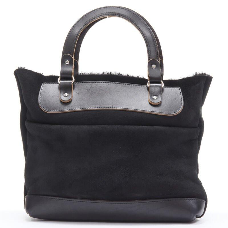 Donna MARNI borsa morbida con manico superiore foderata in shearling nero in vendita