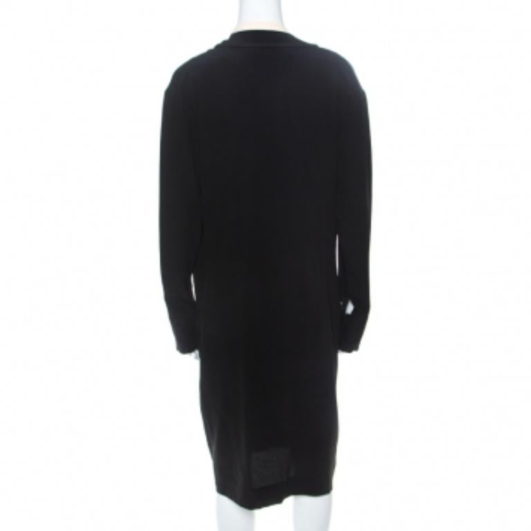 This Marni dress is every bit stylish and classy. Go for this calming black ensemble when you are in the mood to dress minimally. Beautifully made in 100% silk, this dress feature a contrast collar detail, long sleeves and zip closure.