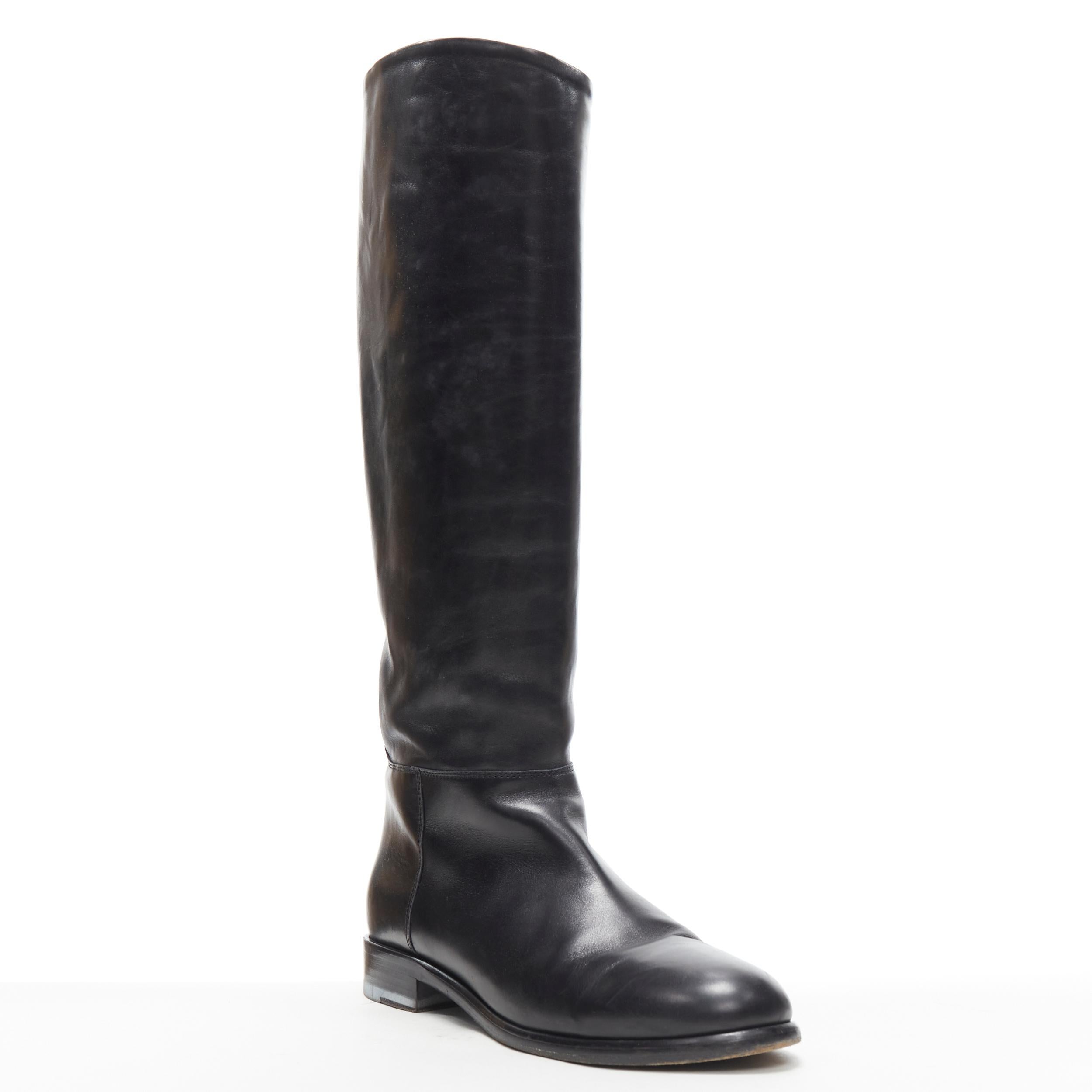 MARNI black smooth calf leather round toe flat pull on tall boot EU40.5 
Reference: UIHG/A00028 
Brand: Marni 
Material: Leather 
Color: Black 
Pattern: Solid 
Made in: Italy 

CONDITION: 
Condition: Very good, this item was pre-owned and is in very
