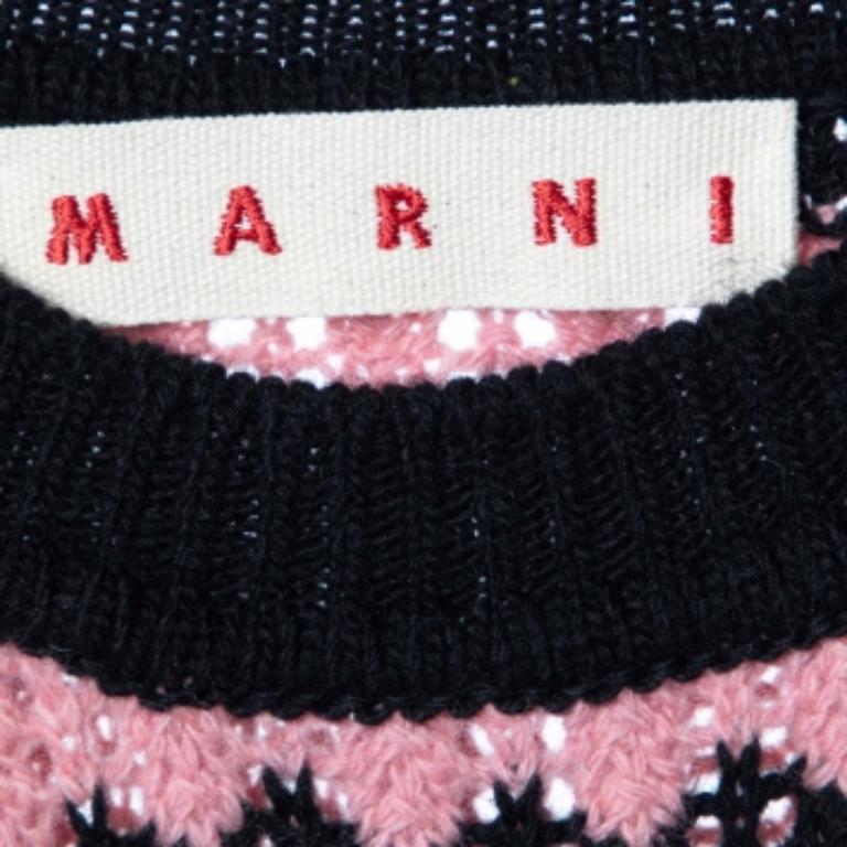 Enveloppez-vous de chaleur et de style avec ce pull Marni. Méticuleusement conçu pour le confort et la mode, il incarne la sophistication intemporelle. Chaque point reflète la qualité, ce qui en fait une pièce essentielle de toute garde-robe.