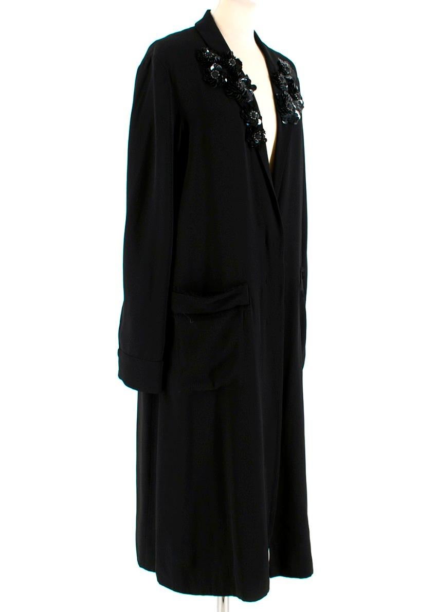 Marni Black V-Neck Embellished Longline Coat Dress

- Featuring sequin detailing across the collar with diamonte embellishments 

- Patch pockets with raw edge detailing

- concealed buttons (covered by fabric) going down the front of the dress

-