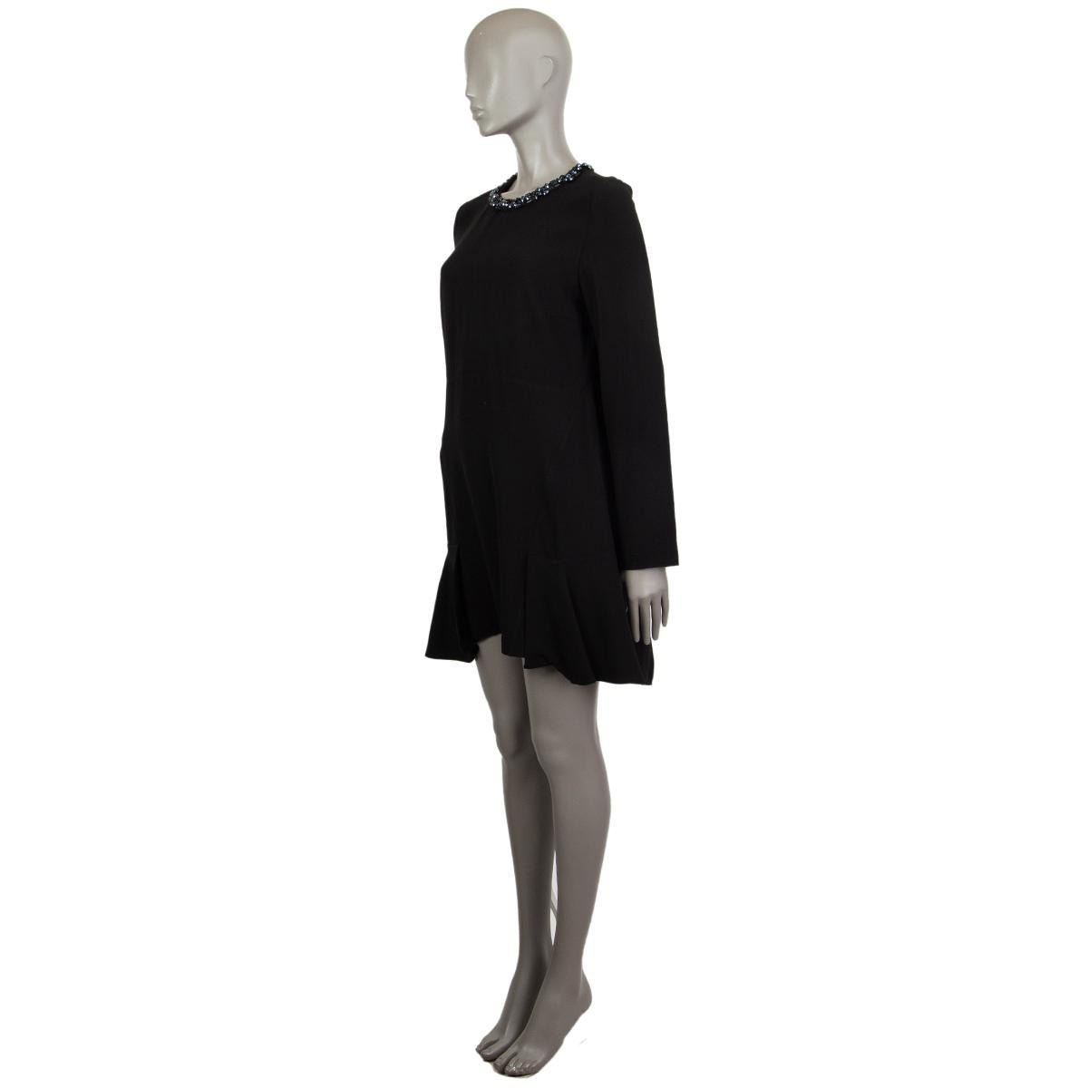 100% authentic Marni long-sleeve dress in black viscose (58%) and acetate (42%). With rhinestone embellishments around the neck and pleated hemline. Closes with invisible zipper on the back. Unlined. Has been worn and is in excellent