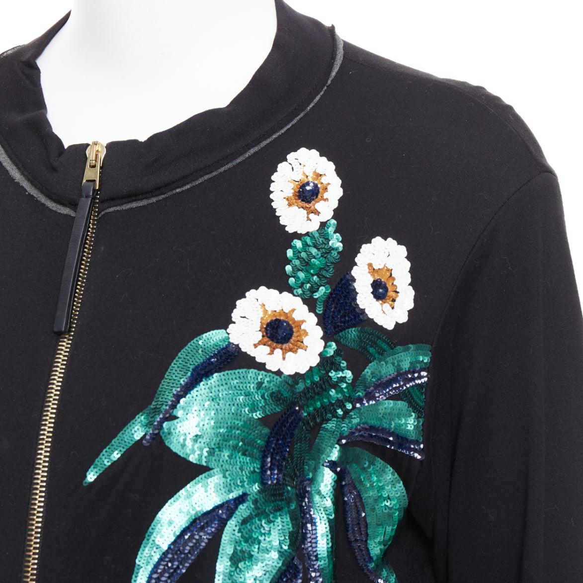 MARNI negro blanco verde lentejuelas flor cuero cremallera chaqueta jersey IT42 M
Referencia: WECN/A00015
Marca Marni
Material: Viscosa
Color: Negro, Multicolor
Patrón: Floral
Cierre: cremallera
Detalles adicionales: Cremallera