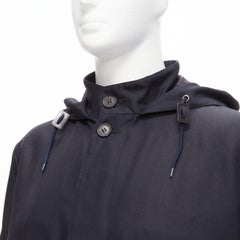 MARNI parka en laine noire à capuche et boutons dissimulés IT48 M