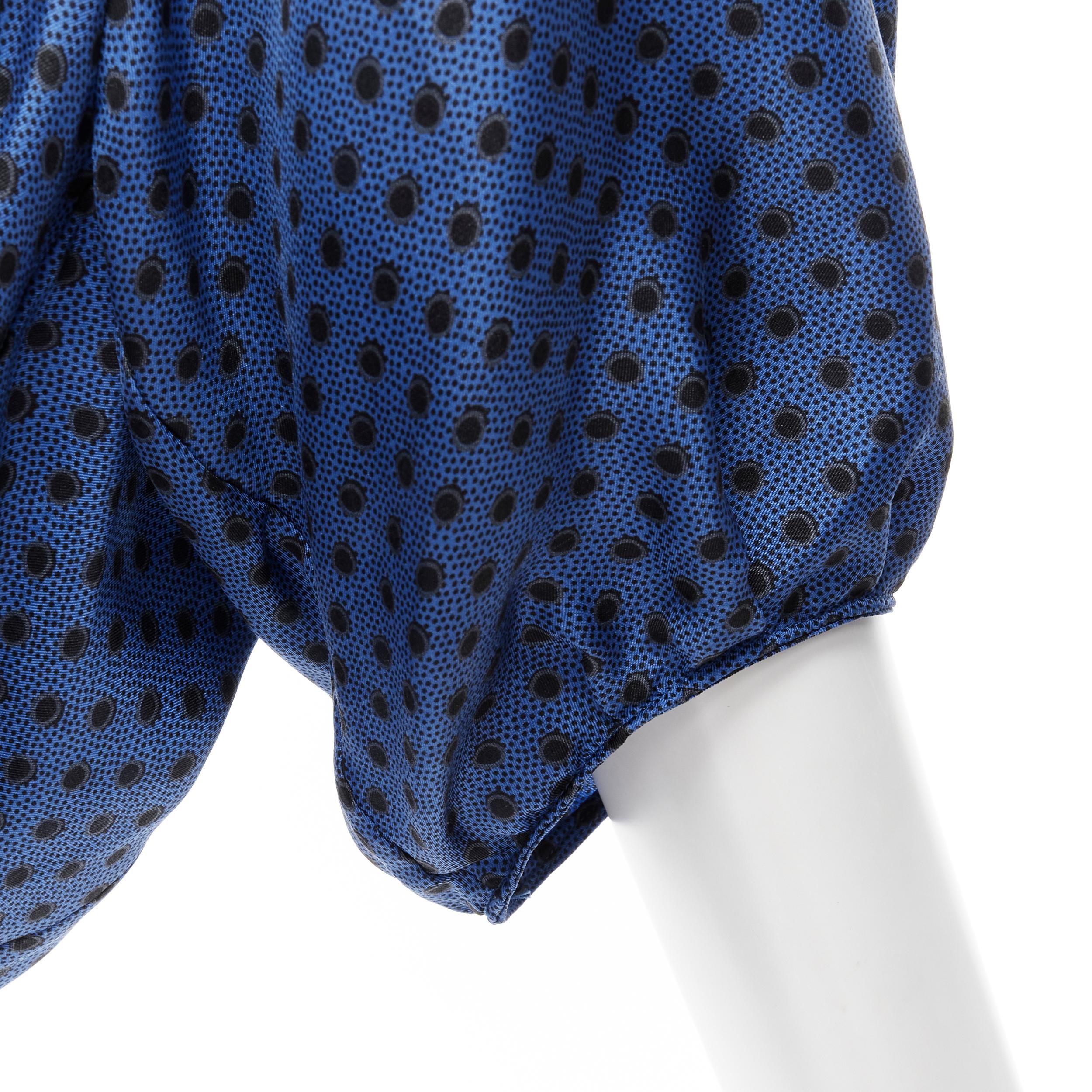 MARNI blue black polka dot silk bubble sleeve peplum blouse top IT42 M 
Reference: CELG/A00132 
Brand: Marni 
Material: Silk 
Color: Blue 
Pattern: Polka Dot 
Closure: Zip Extra Detail: Spread slit collar. Bubble sleeve. Slit side. 
Estimated Retail