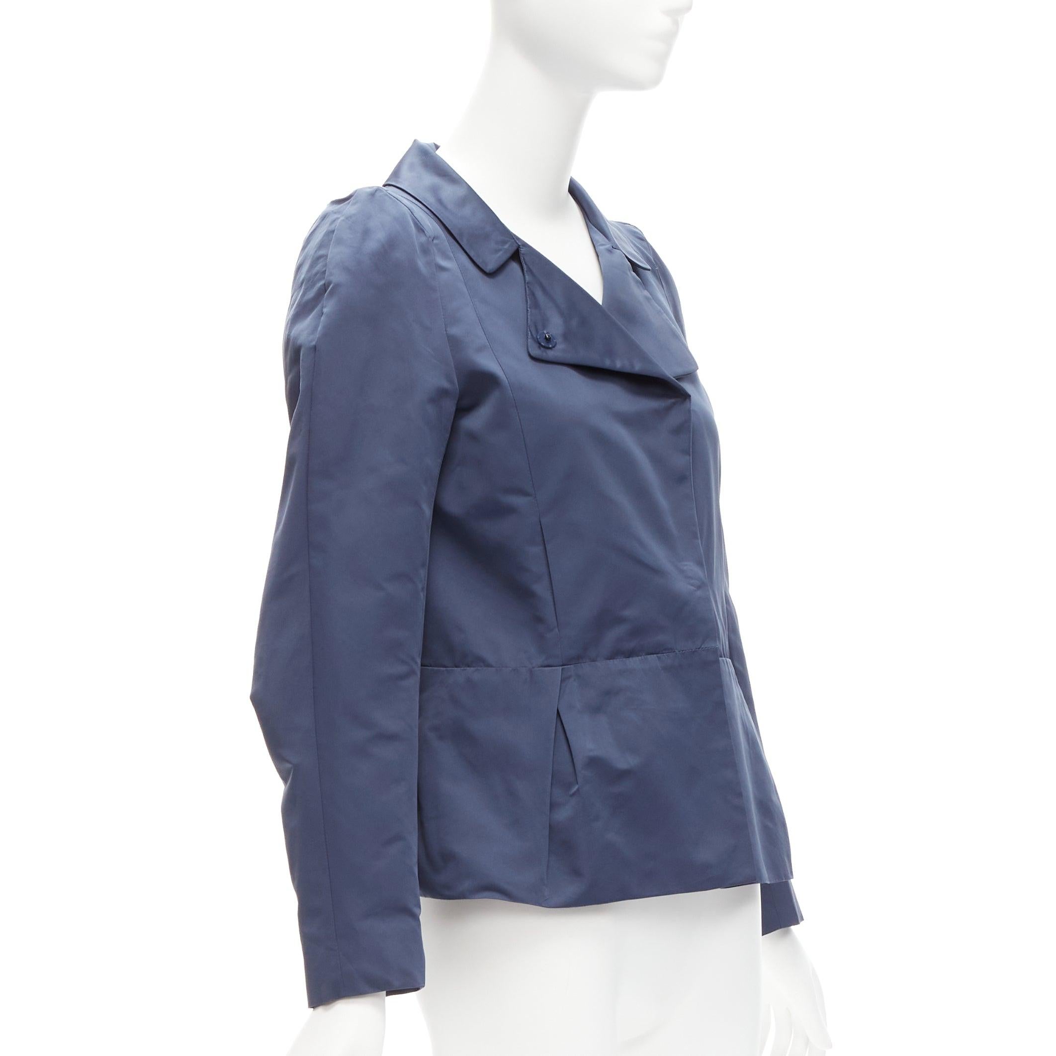 MARNI blue satin structural puff shoulder peplum minimal cropped jacket IT42 M
Reference: CELG/A00235
Brand: Marni
Material: Polyester
Color: Blue
Pattern: Solid
Closure: Snap Buttons
Lining: Navy Fabric
Extra Details: Hidden snap buttons. Lined and
