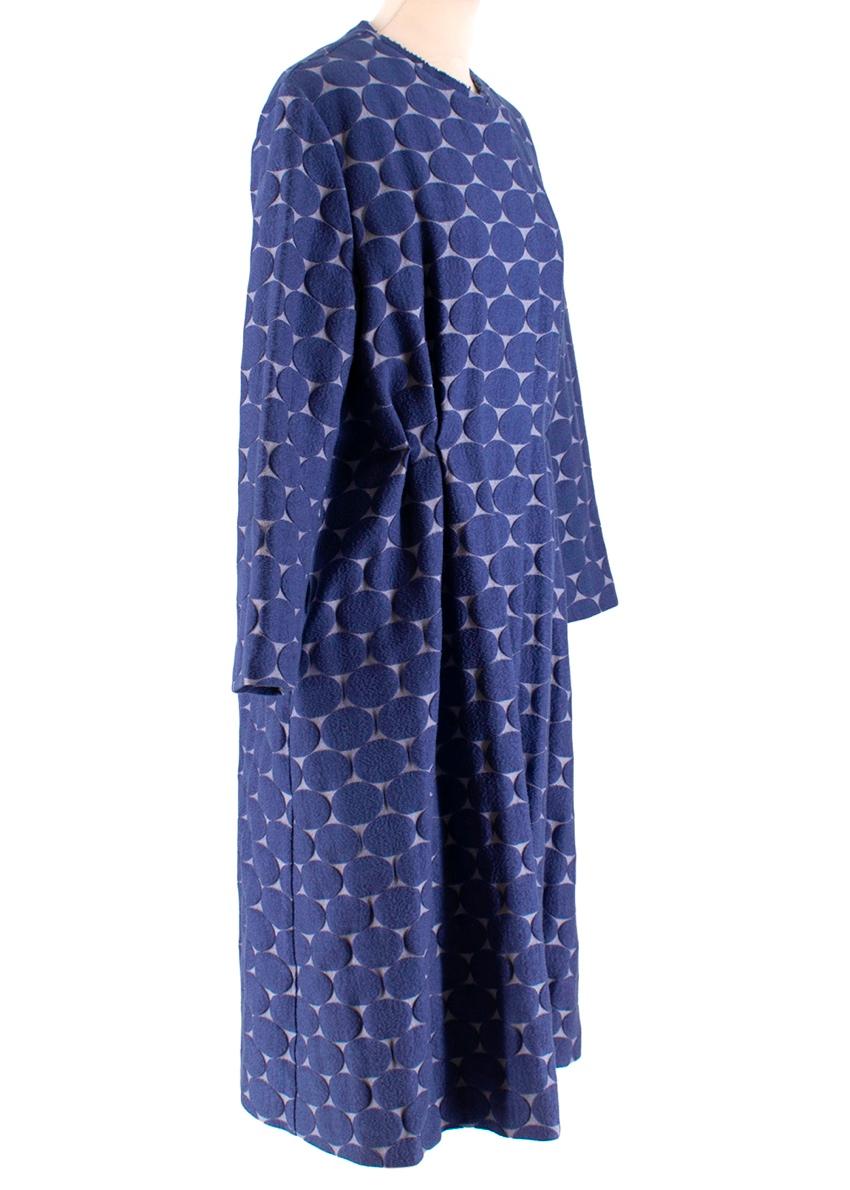 Marni Blue Textured Circle Embroidered Coat

- Raw hem collar
- Button closures
- Textured large polka dots
- Cinched waist 
- Long length
- Large pockets

Materials:
- 73% Cotton
- 8% Polyester
- 9% Silk

Made in Italy

Professional Cleaning