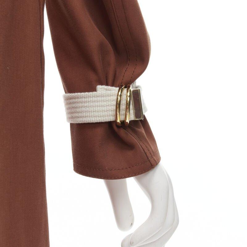 MARNI - Manteau à capuche en coton rouge brique avec fermeture éclair sur le devant - IT40 S
Référence : CELG/A00151
Marque : Marni
Matière : Coton, soie
Couleur : Rouge
Motif : Solide
Fermeture : Zip
Détails supplémentaires : Bracelet en nylon au