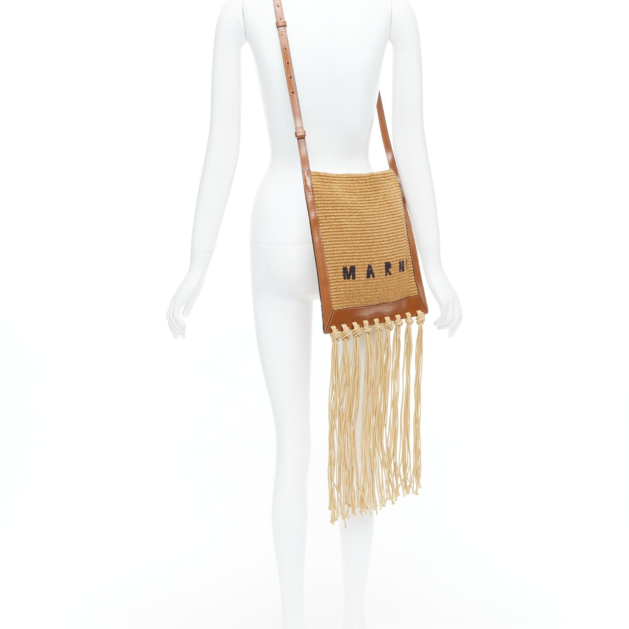 MARNI brown raffia fringe leather trim black logo crossbody bag
Reference: ALCU/A00032
Brand: Marni
Material: Raffia, Leather
Color: Brown, Black
Pattern: Solid
Closure: Zip
Lining: Nude Fabric
Extra Details: Brown raffia/leather logo embroidered