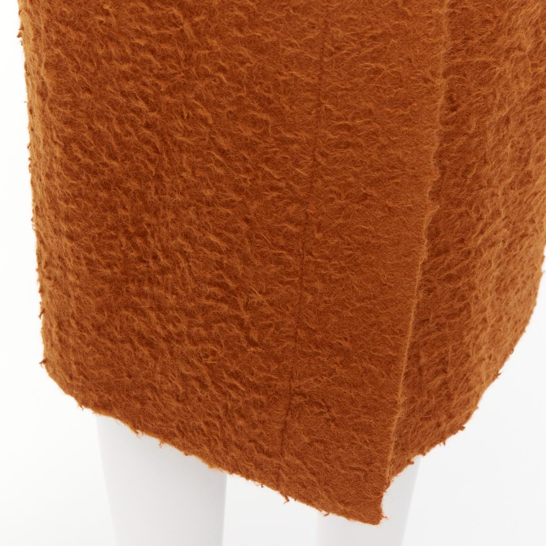 MARNI brown textured alpaca silk pocketed front slit pencil skirt IT38 XS
Reference: CELG/A00429
Brand: Marni
Material: Alpaca, Silk
Color: Brown
Pattern: Solid
Closure: Zip Fly
Lining: Black Fabric
Made in: Italy

CONDITION:
Condition: Excellent,