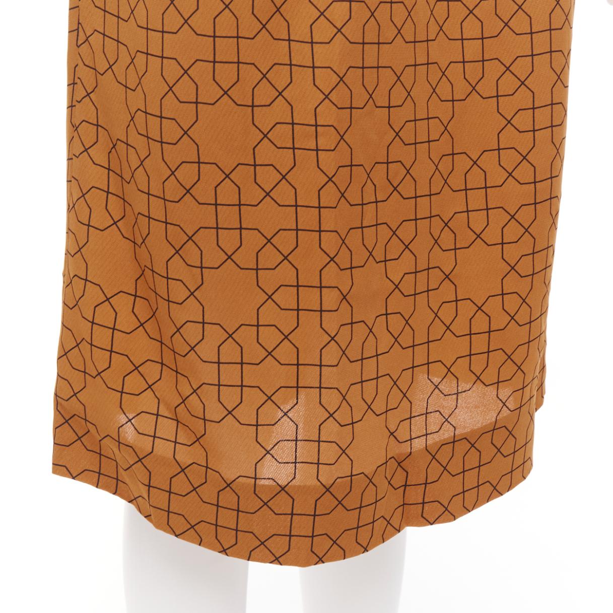 MARNI brown viscose black oriental geometric print knee length skirt IT40 S
Reference: CELG/A00434
Brand: Marni
Material: Viscose
Color: Brown, Black
Pattern: Abstract
Closure: Zip
Made in: Italy

CONDITION:
Condition: Excellent, this item was