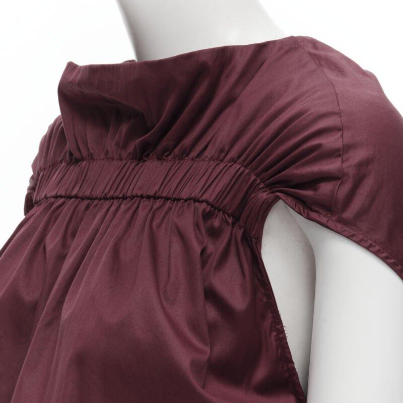 MARNI burgundy red cotton elasticated ruched cap sleeve boxy top IT38 XS
Reference: CELG/A00131
Brand: Marni
Material: Cotton
Color: Red
Pattern: Solid
Extra Details: Elasticated band across bust. Side slit pockets.
Made in: