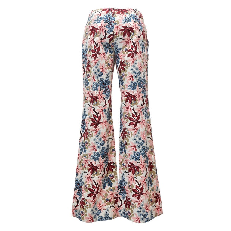 The 1970s were an an endless source of inspiration for Consuelo Castiglioni, whose clothes conjure up sunny holidays in the Mediterranean or long strolls across desert islands. This pair of cotton printed pants, with its lush flower print recalling