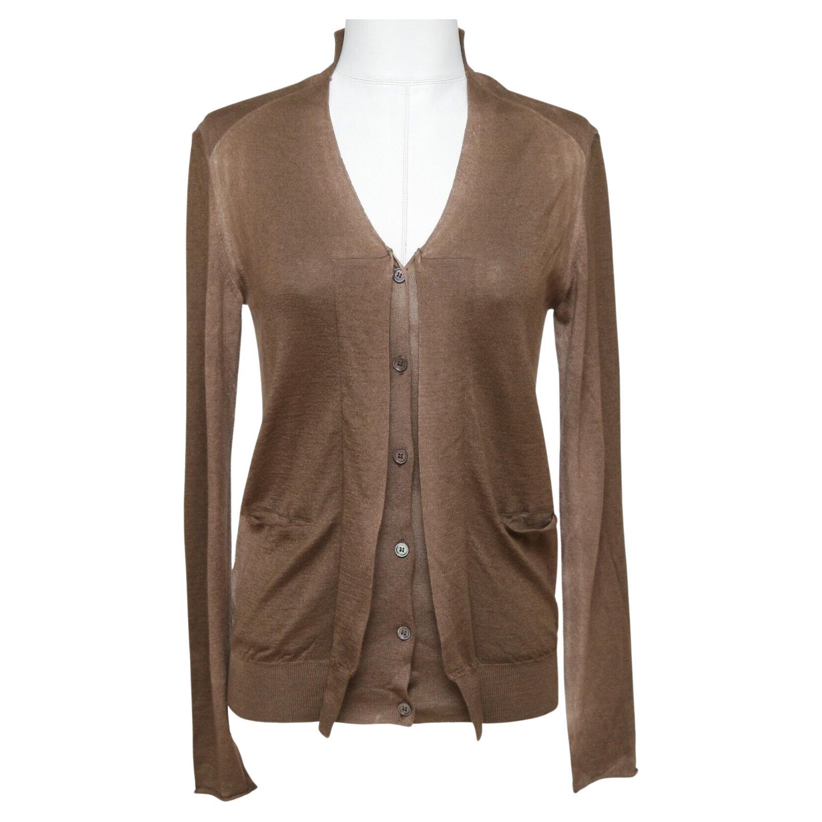 GUARANTEED AUTHENTIC LOVELY MARNI BROWN OMBRE CASHMERE BLEND CARDIGAN

Retailed excluding sales taxes $900


Details:
- Lightweight brown ombre color cardigan has a great easy fit.
- Long sleeve.
- V-neck, front button closure.
- Dual front slip