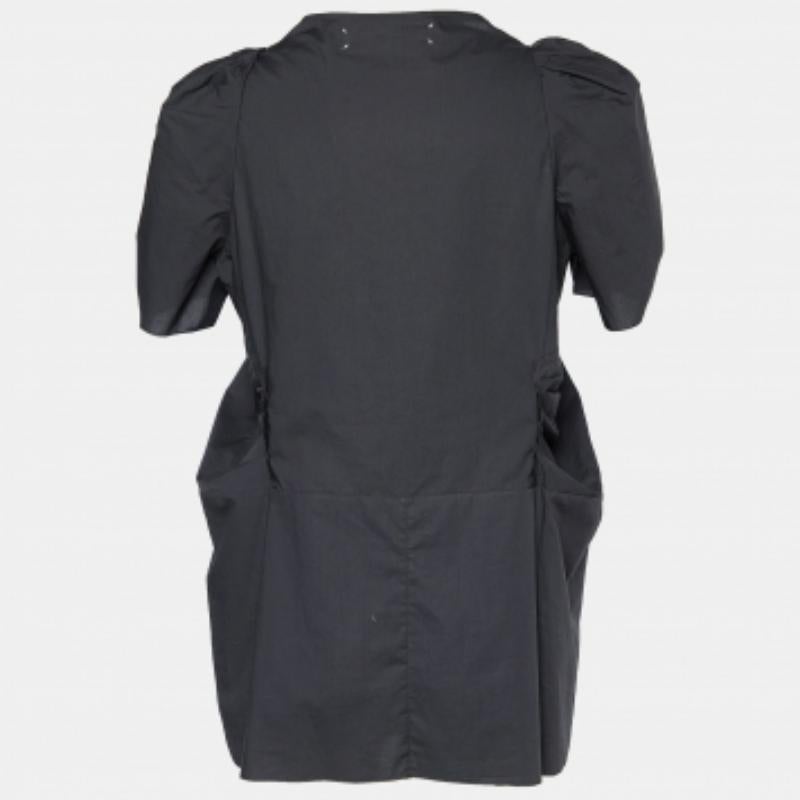 Die sorgfältige Verarbeitung, die hochwertigen Materialien und die eleganten Schnitte machen dieses Designer-Top zu einem echten Schmuckstück! Er hat ein klassisches Design, das leicht zu stylen ist.