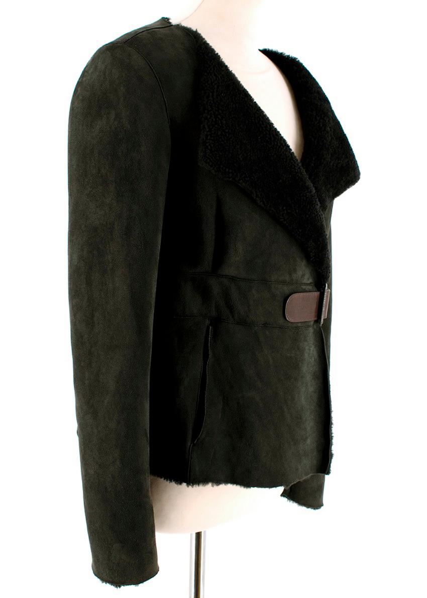 Marni Charcoal Grey Merino Lambskin Belted Jacket

- Soft touch
- Black fleece inner and lapels
- Brown leather belt fastening at waist
- Inside button fastening
- Mid-weight
- Fully-lined, concealed pockets on each side

Materials:
100% Merino