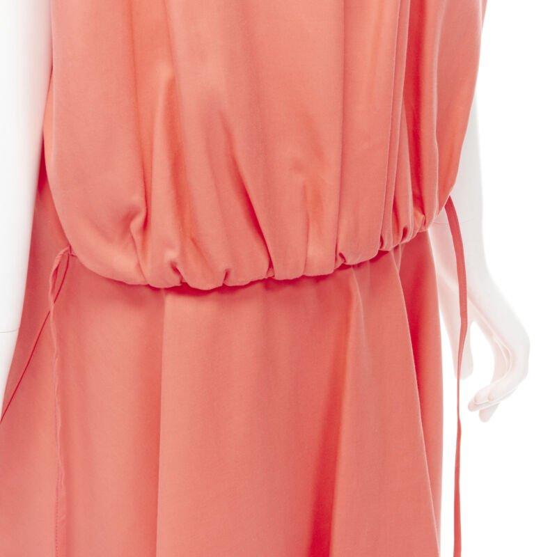 MARNI coral pink cotton silk pleated bubble back boxy sleeveless dress IT40
Reference: CELG/A00167
Brand: Marni
Material: Cotton, Silk
Color: Pink
Pattern: Solid
Closure: Button
Extra Details: Dual slit front pockets. Drawstring at low waist back to