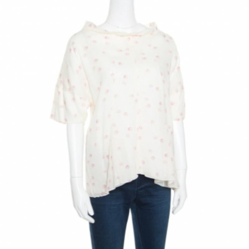 Nos encanta este top de Marni, porque tiene mucho estilo y es perfecto para vestir informal. Está confeccionado en algodón y presenta mangas dolman y rayas con estampados florales por todas partes. Puedes combinarlo con vaqueros ajustados o