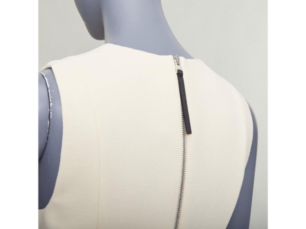 MARNI cream wool curved hip seam pleated crew knee shift dress IT38 XS
Reference: MECG/A00175
Brand: Marni
Material: Wool
Color: Cream
Pattern: Solid
Closure: Zip
Lining: Cream Silk
Extra Details: Silk lined.
Made in: Italy

CONDITION:
Condition: