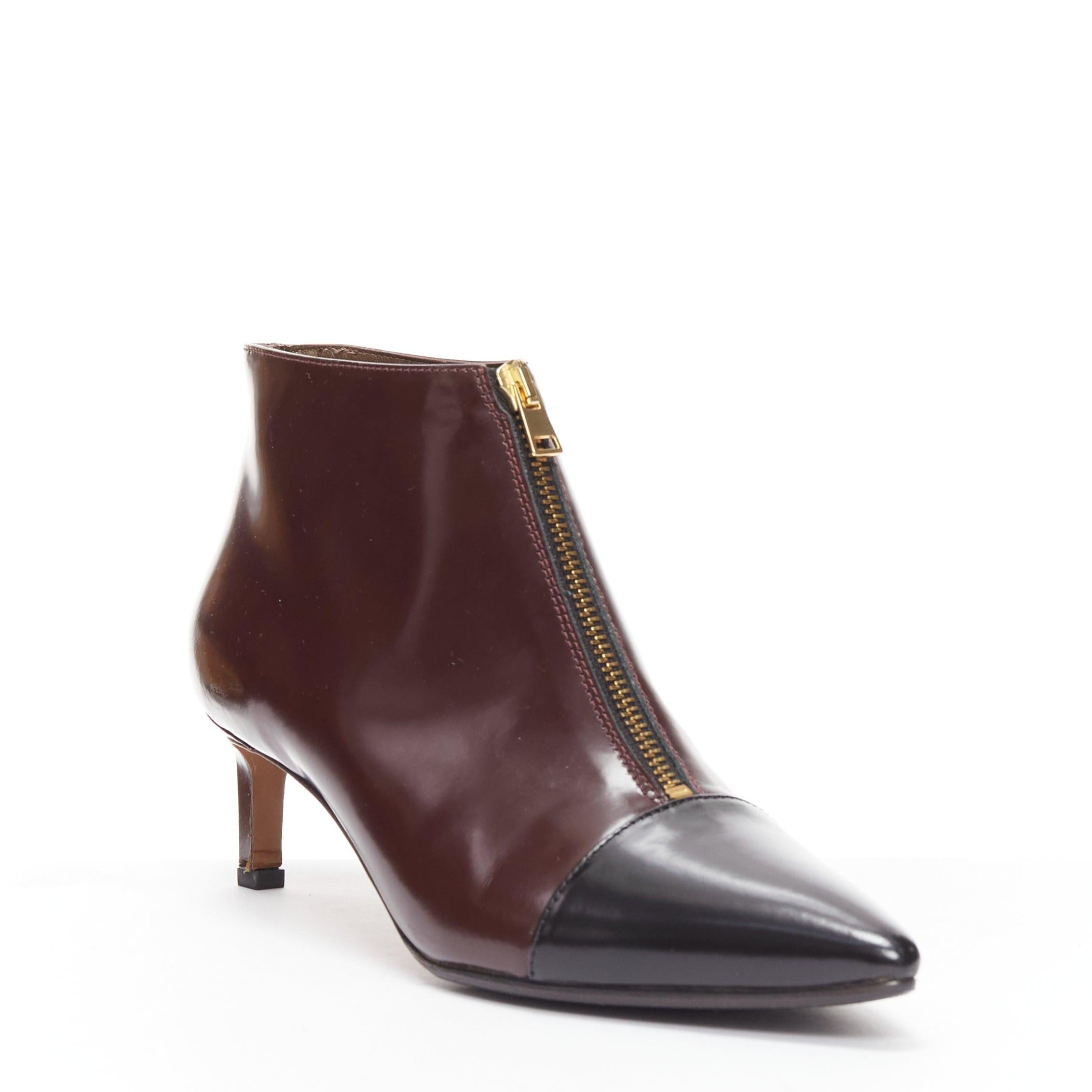 MARNI dark brown black toe cap kitten heel zip front bootie EU37
Reference: CELG/A00367
Brand: Marni
Material: Leather
Color: Brown, Black
Pattern: Solid
Closure: Zip
Lining: Brown Leather
Made in: Italy

CONDITION:
Condition: Very good, this item
