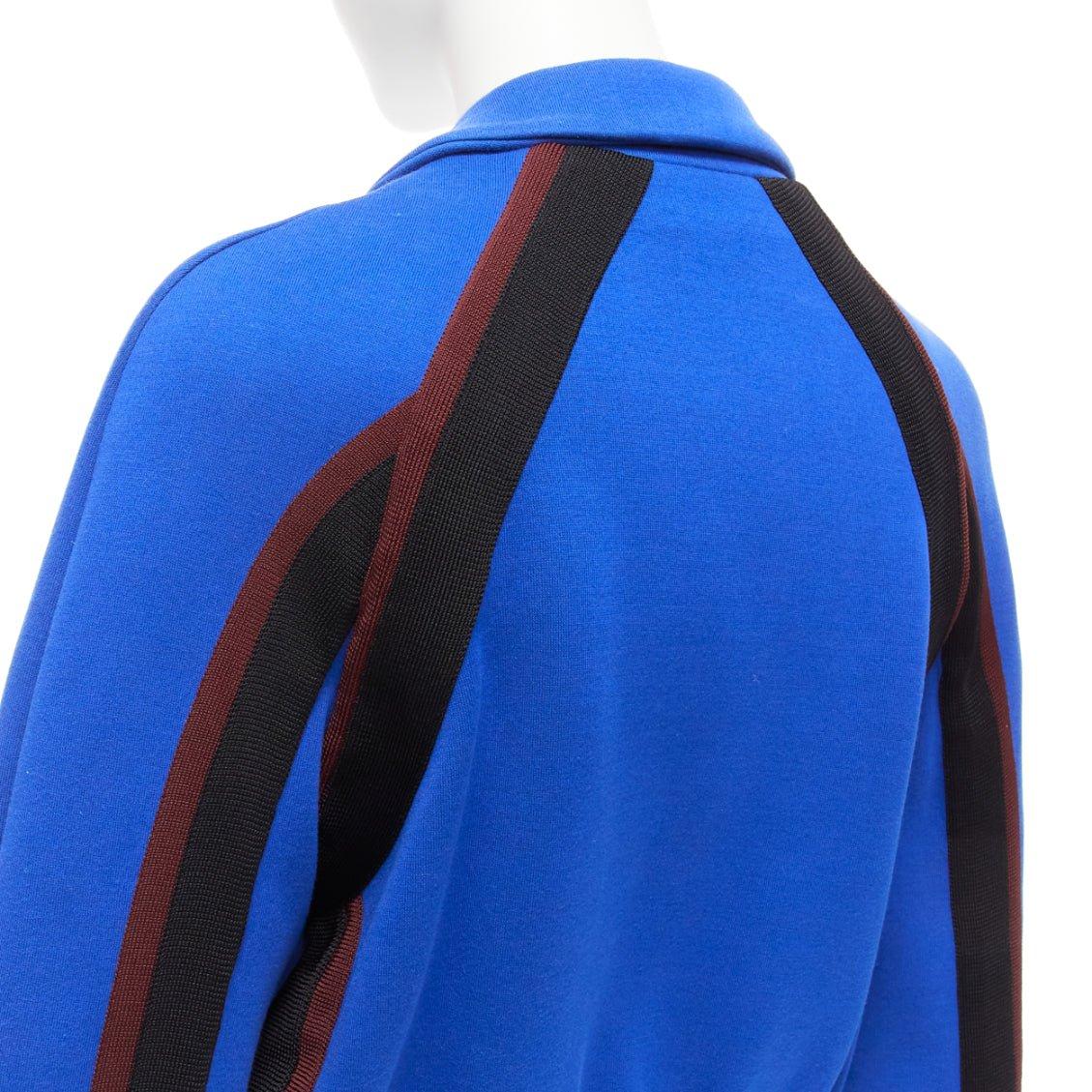 MARNI electric blue track suit raglan bomber jacket IT38 XS
Reference: CELG/A00238
Brand: Marni
Material: Cotton, Blend
Color: Blue, Multicolour
Pattern: Solid
Closure: Zip
Lining: Brown Fabric
Made in: Italy

CONDITION:
Condition: Very good, this