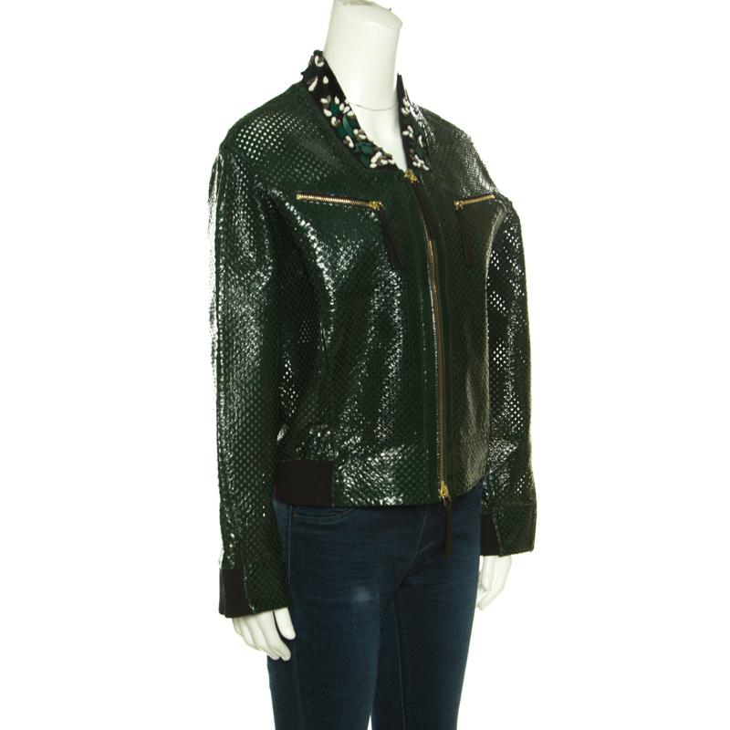 Marni brings you this fabulous bomber jacket to make you look chic, smart and very stylish! The green creation is made of a goat leather blend and features a perforated design pattern. It flaunts floral beads and sequins embellished collars, twin