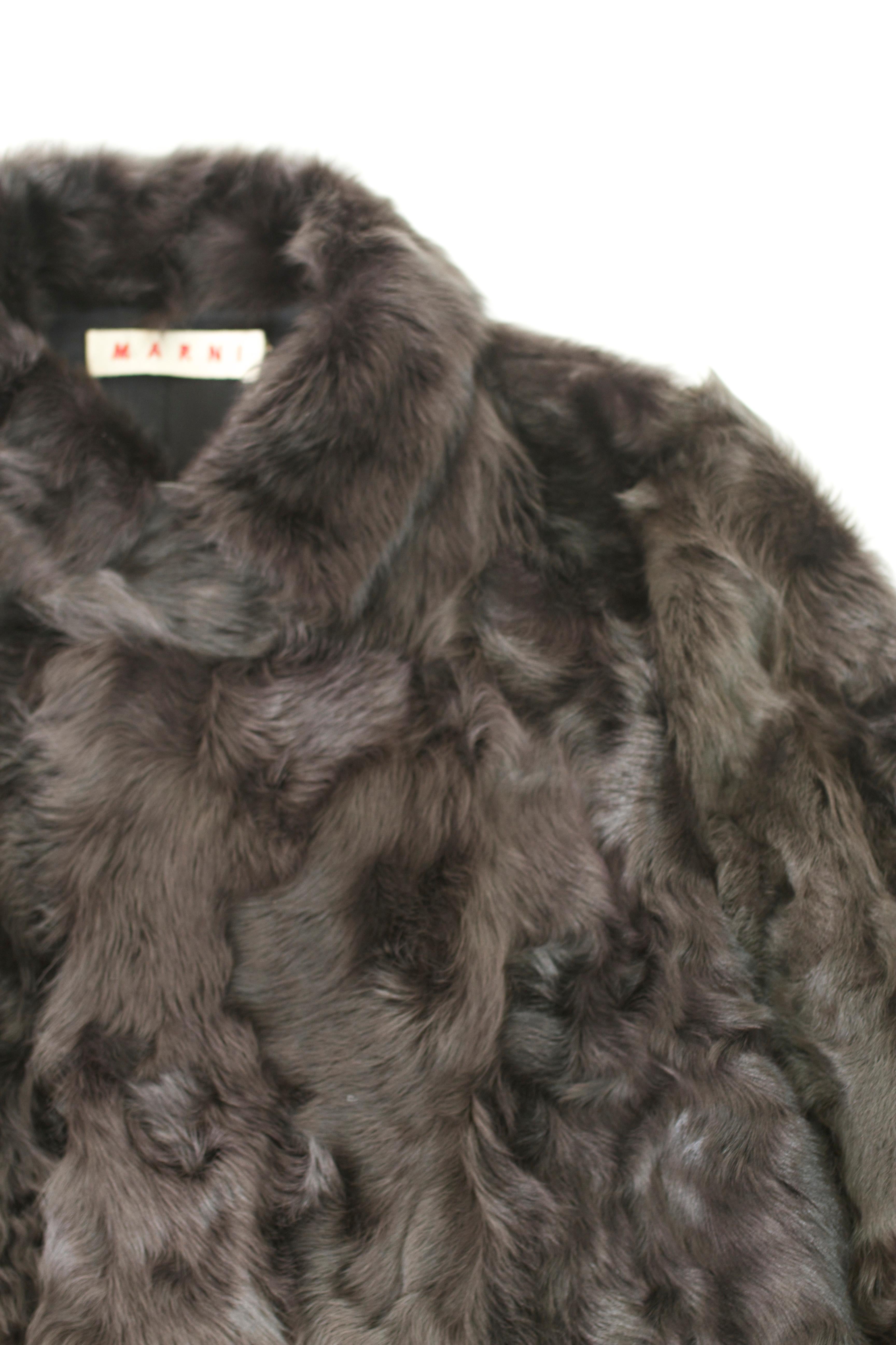 Magnificent Marni coat in a rich goat fur with full leather lining, and vented arm-holes for breathability. 

Pit-to-pit: 23 Inches
Length from bottom of collar: 32 Inches
Sleeve Length: 28 Inches