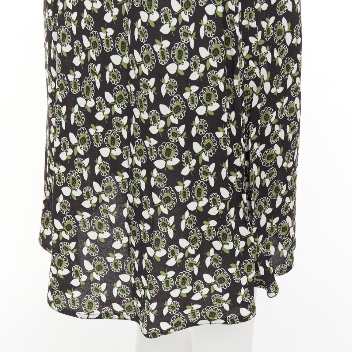 MARNI green black floral print viscose mid waist midi skirt IT40 S
Reference: CELG/A00433
Brand: Marni
Material: Viscose
Color: Green, Black
Pattern: Floral
Closure: Zip
Made in: Italy

CONDITION:
Condition: Excellent, this item was pre-owned and is