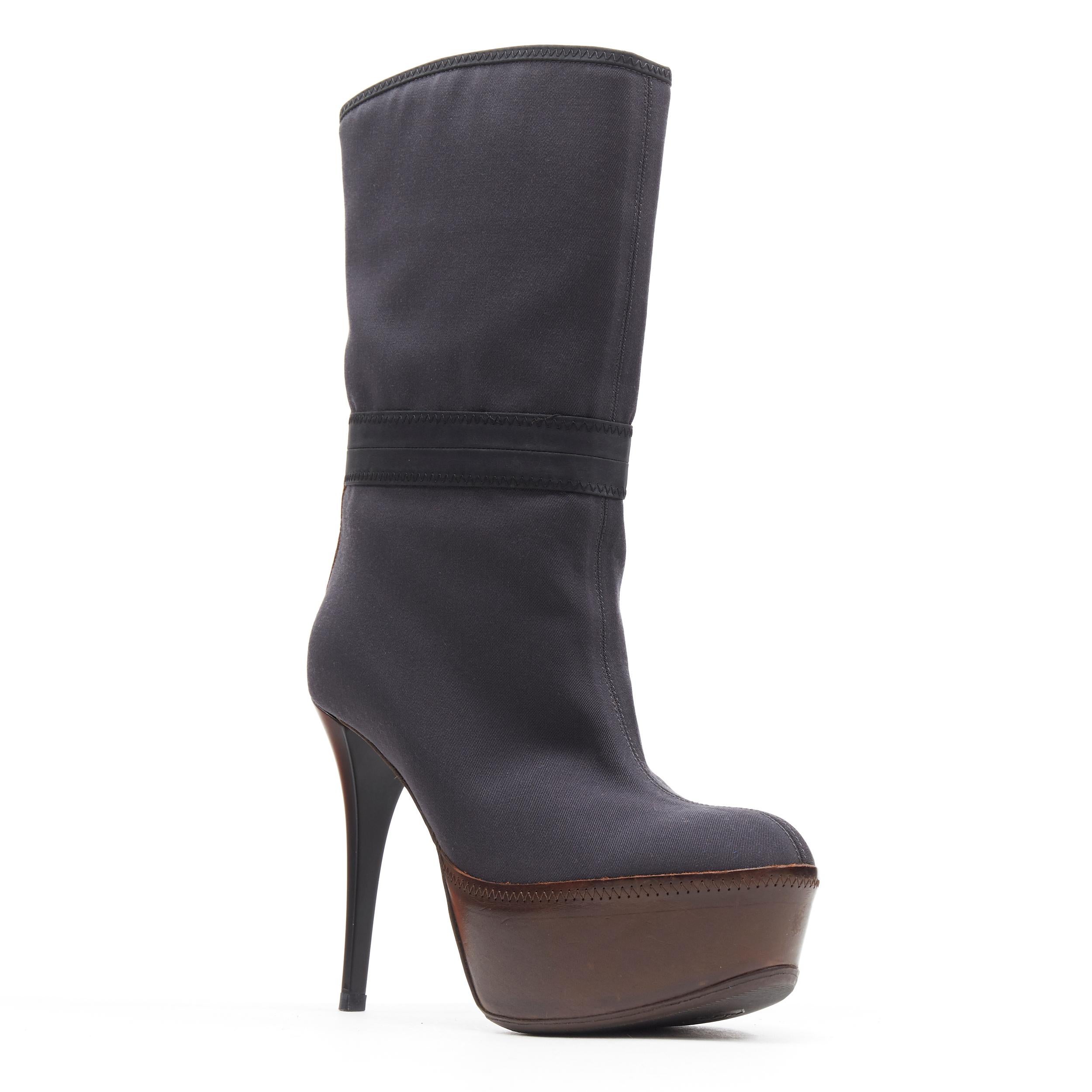 MARNI grey fabric upper brown leather platform round toe high heel boot EU36
Brand: Marni
Model Name / Style: Platfom boot
Material: Fabric
Color: Grey
Pattern: Solid
Closure: Pull on
Extra Detail: Ultra High (4 in & Higher) heel height. Almond toe.