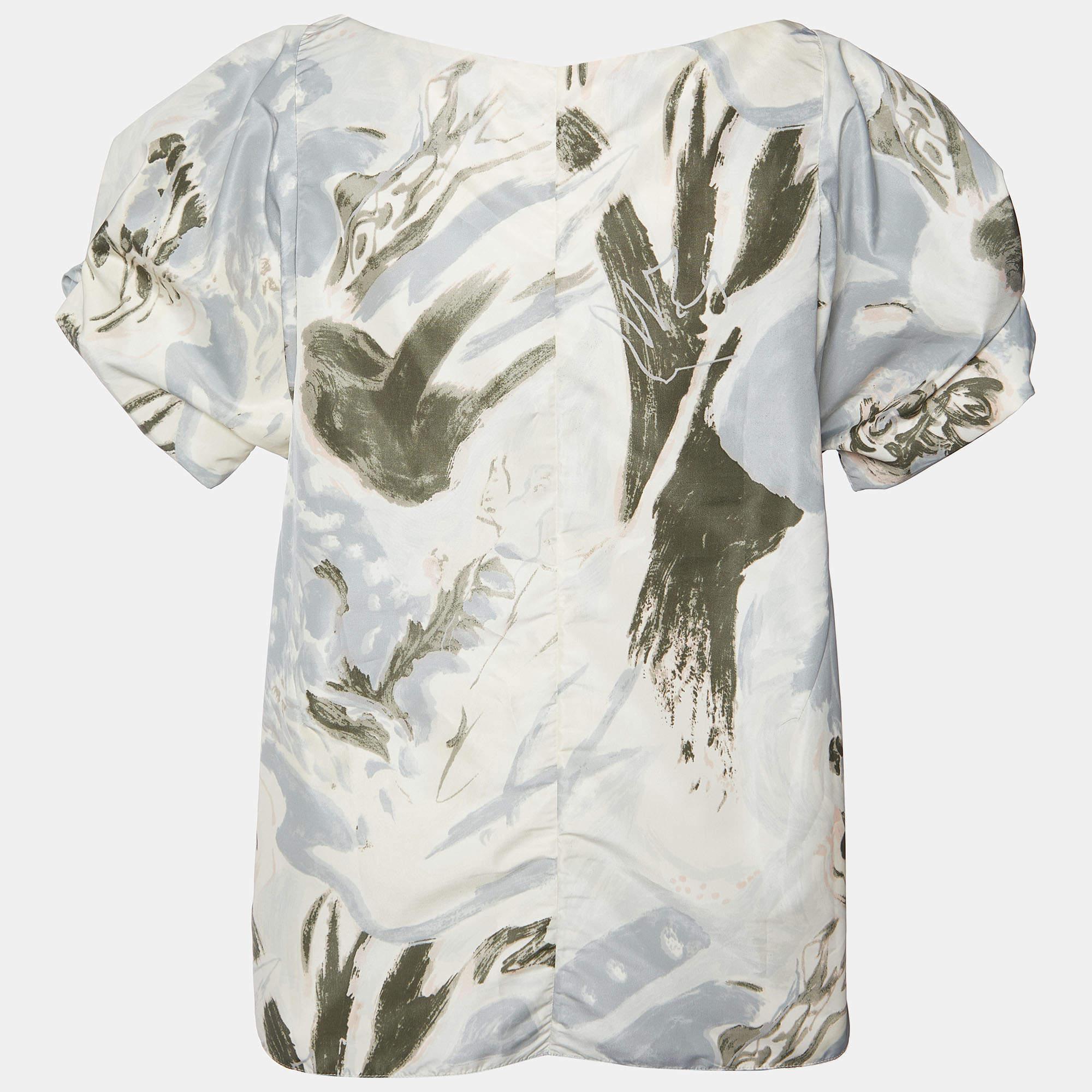 Questo top griffato offre stile e comfort. Realizzata con i migliori tessuti, la creazione è stata curata nei minimi dettagli. Abbinalo a una gonna e a dei tacchi.