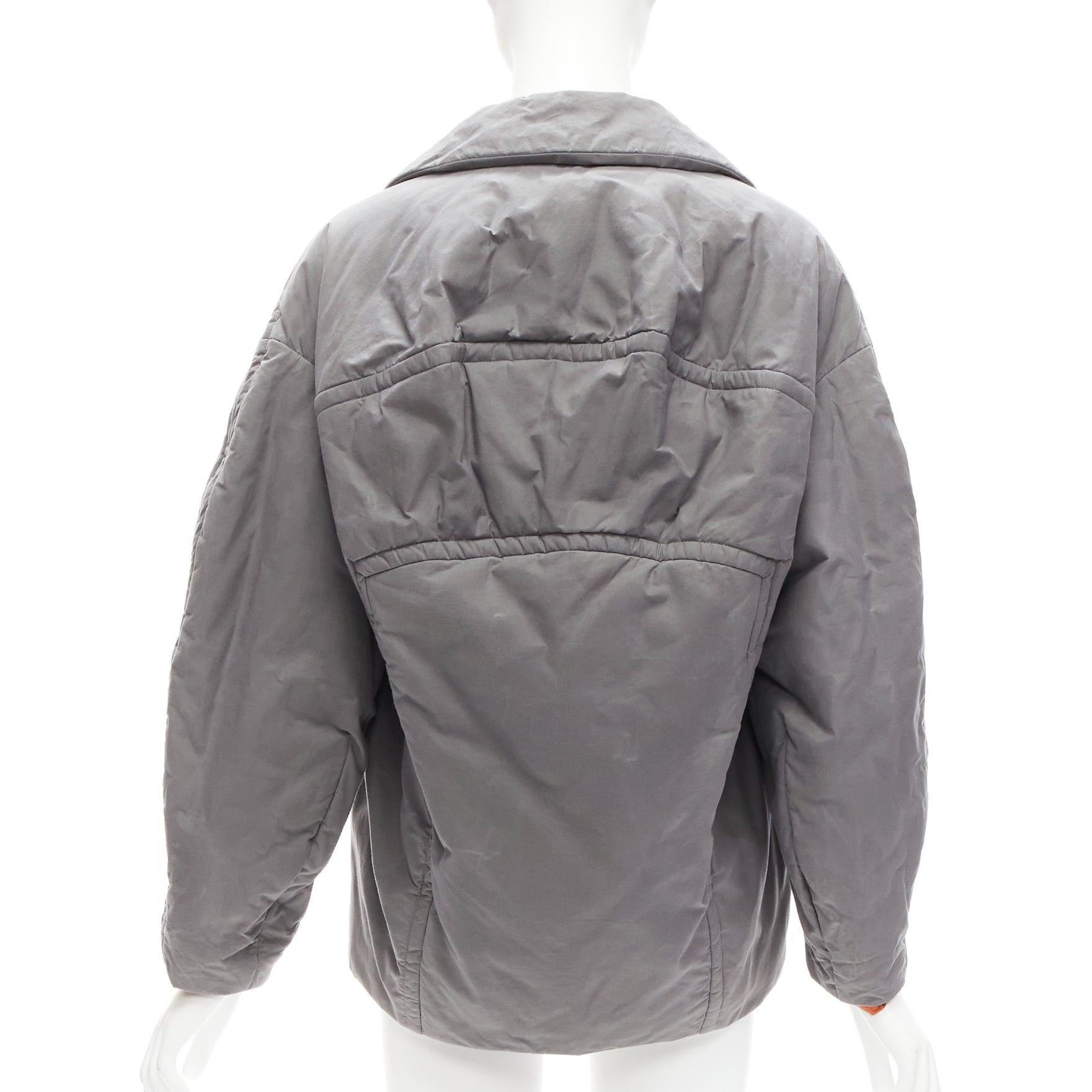 MARNI grey washed cotton brown lined padded cocoon MA1 jacket IT36 XS
Reference: CELG/A00246
Brand: Marni
Material: Cotton
Color: Grey
Pattern: Solid
Closure: Button
Lining: Brown Fabric
Extra Details: MA1 bomber inspired. Hidden buttons. Cocoon