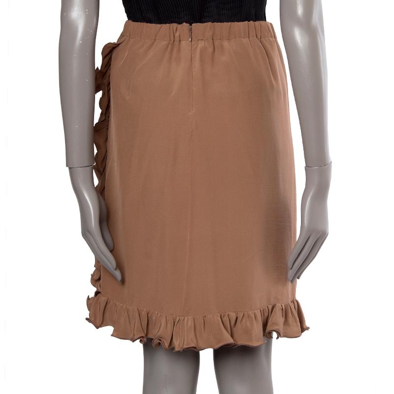 100% authentic Marni A-line skirt in hazelnut silk (100%). With elastic waistband and ruffled detail down the front and around the hemline. Closes with invisible side zipper. Unlined. Has been worn and is in excellent