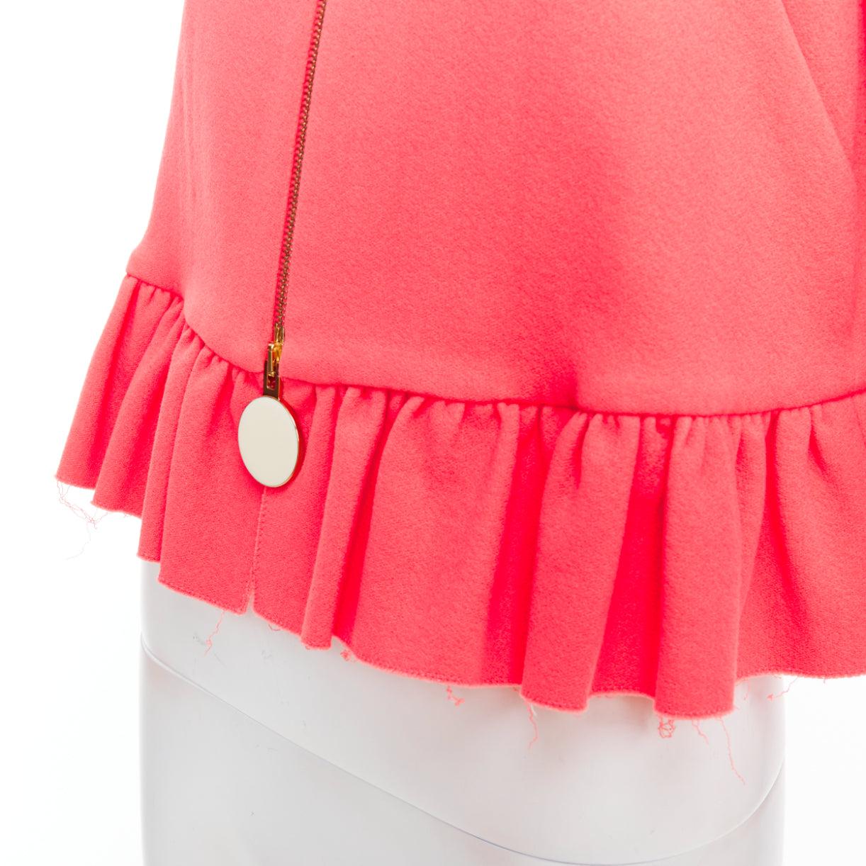 MARNI hot pink cotton blend ruffle hem zip front cropped jacket IT38 XS
Reference: WECN/A00008
Brand: Marni
Material: Cotton, Blend
Color: Pink, Cream
Pattern: Solid
Closure: Zip
Made in: Italy

CONDITION:
Condition: Good, this item was pre-owned