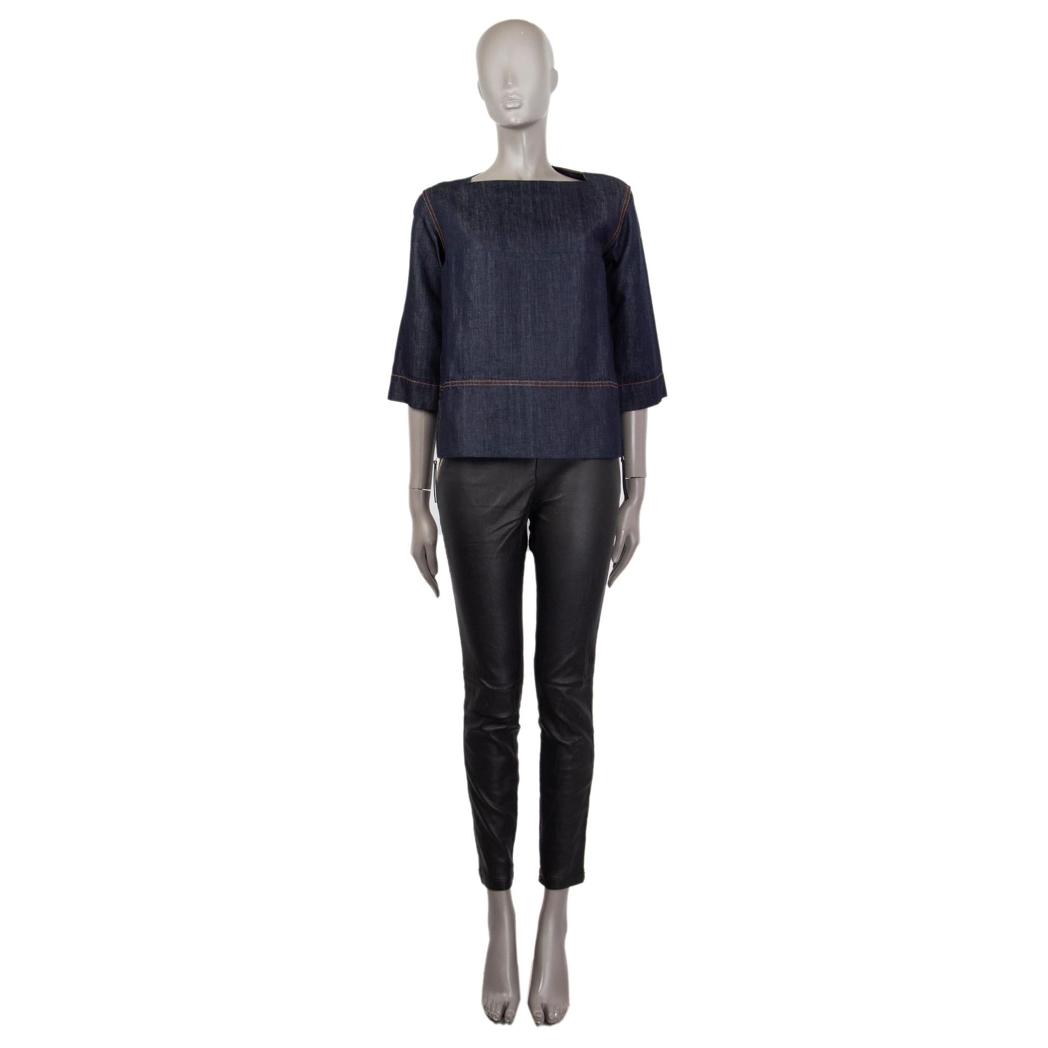 100% authentic Marni 3/4-sleeve denim blouse in indigo cotton (70%) and linen (30%) with a squared-neck. Has slits on the sides that close with gold-toned zippers. Unlined. Has been worn and is in excellent condition. 

Measurements
Tag