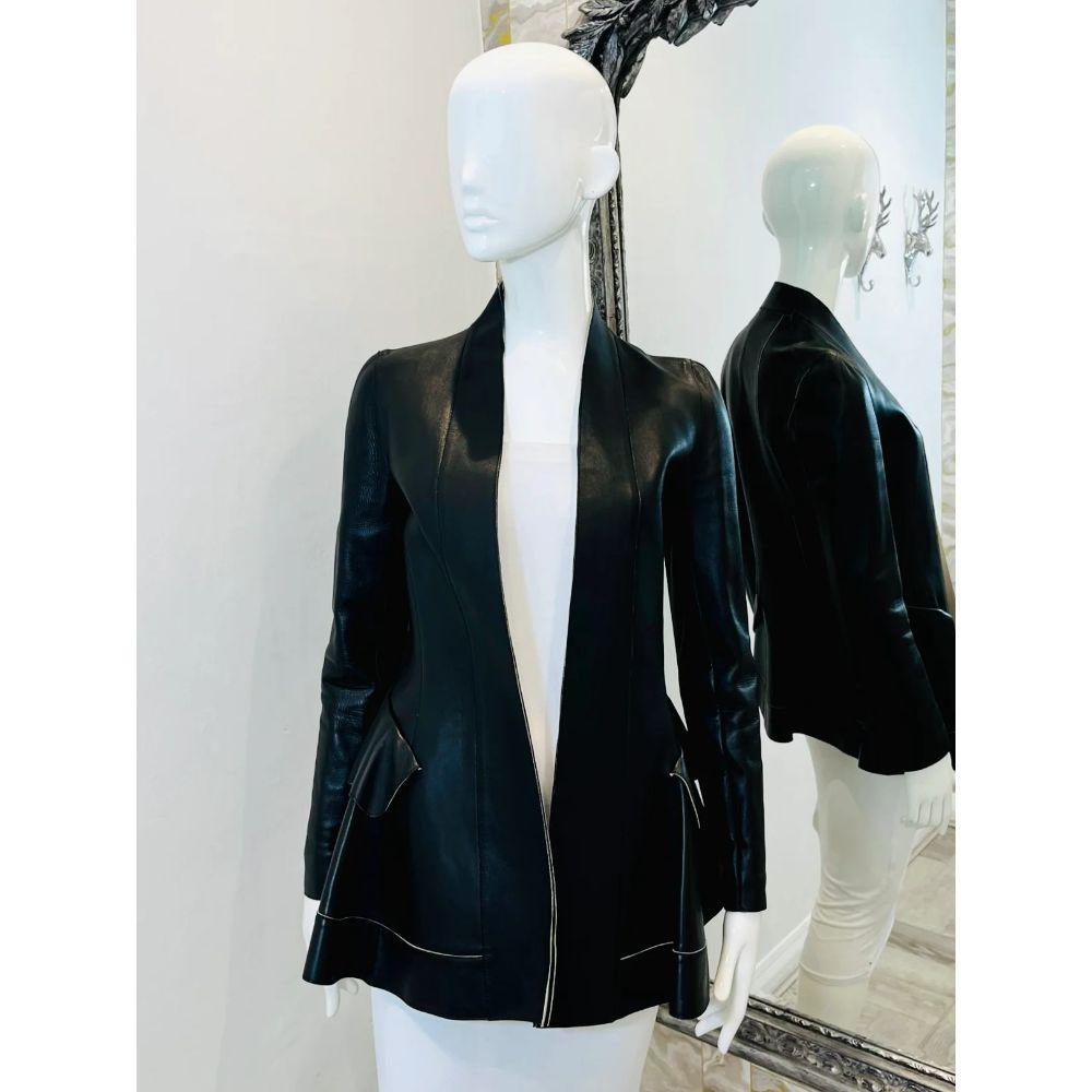 Marni Lambskin Leather Jacket

Black soft leather stylised jacket with flap pockets and ivory leather interior and trim. Open jacket with peplum rear.

Additional information:
Size: 38IT
Composition: Lambskin Leather
Condition: Excellent