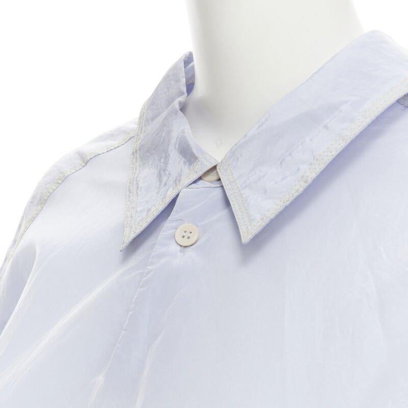 MARNI light blue yellow overstitching crinkled viscose round boxy dress IT38 XS
Reference: CELG/A00203
Brand: Marni
Material: Viscose
Color: Blue
Pattern: Solid
Closure: Button
Extra Details: Button collar. Yellow overstitching detail. V-neck at