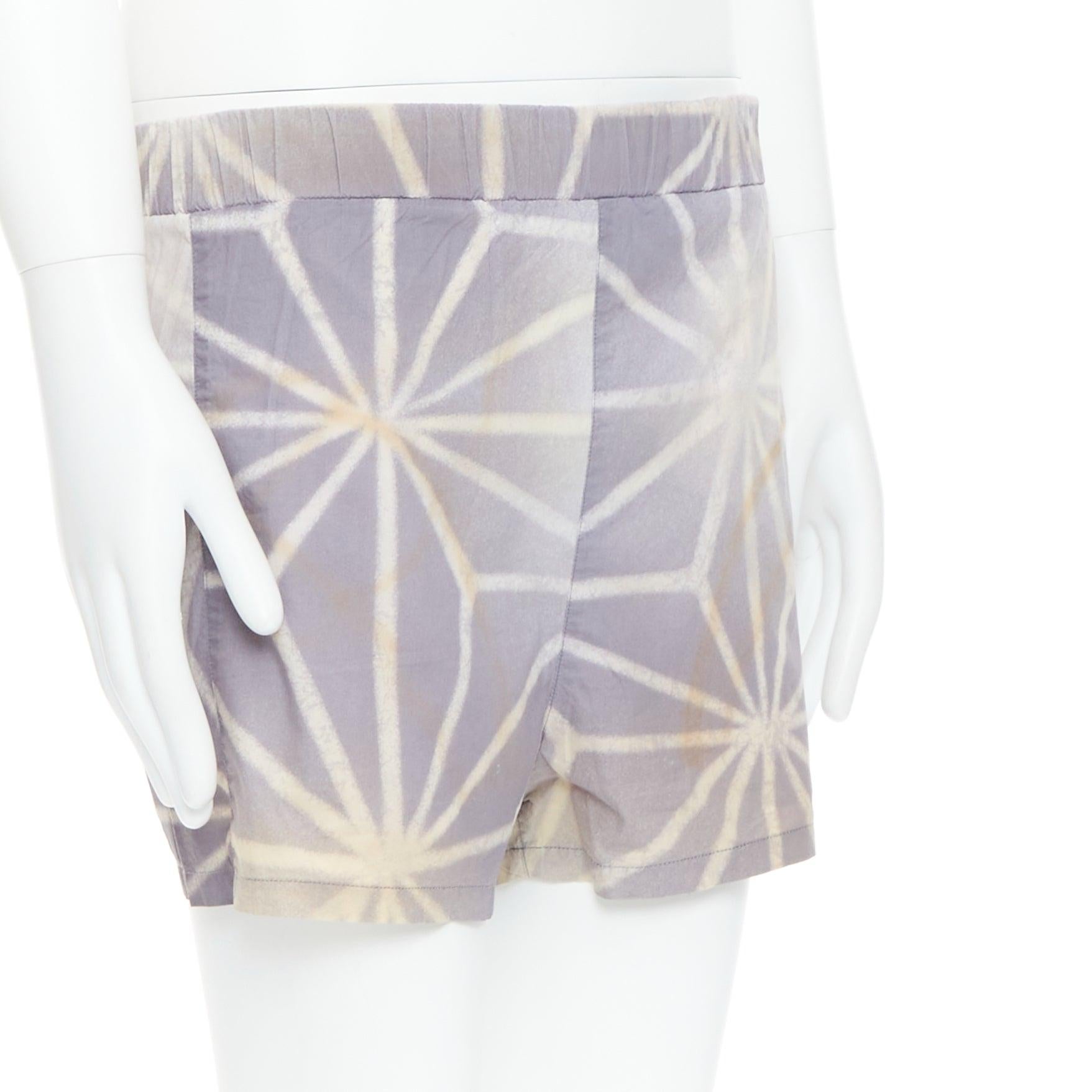 Blanc MARNI short élastique à imprimé abstrait violet clair crème IT46 S en vente
