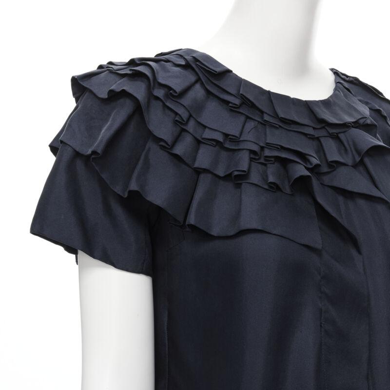 MARNI navy blue 100% silk ruffle neckline short sleeve silk dress IT38 XS
Reference: CELG/A00208
Brand: Marni
Material: Silk
Color: Blue
Pattern: Solid
Closure: Zip
Extra Details: Zip back closure. Dual side slit pockets.
Made in:
