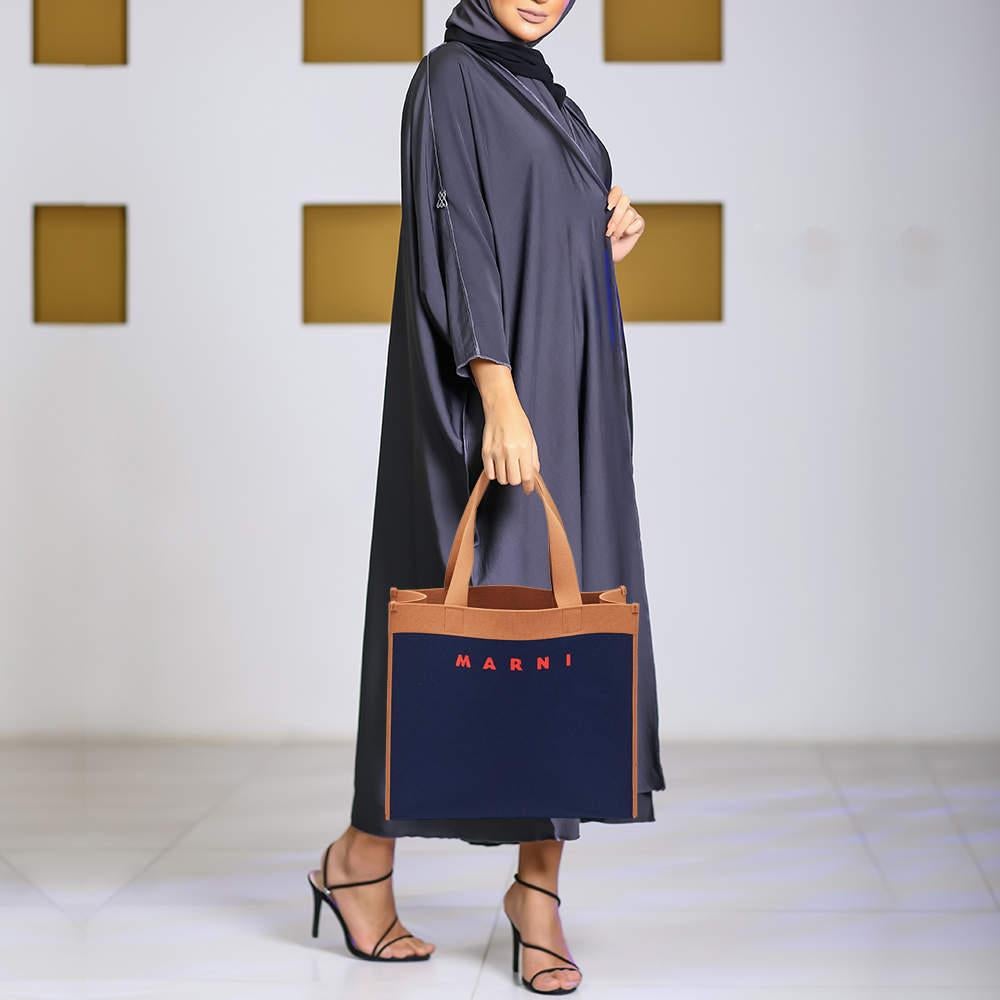 Created from high-quality materials, this tote is enriched with functional and classic elements. It can be carried around conveniently, and its interior is perfectly sized to keep your belongings with ease.

Includes
Original Dustbag, brand tag,