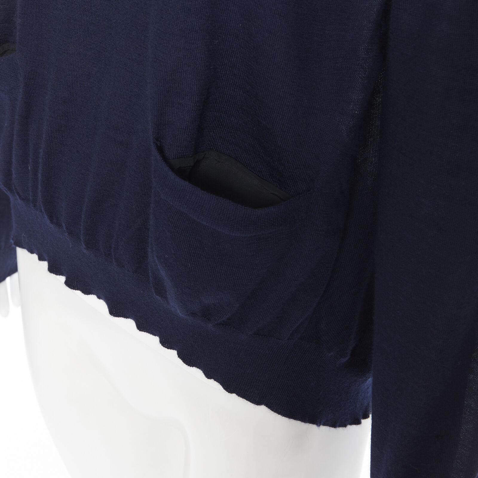 MARNI navy blue cashmere dual front slit pocket long sleeve sweater IT40 S
Reference: SNKO/A00072
Brand: Marni
Material: Cashmere, Blend
Color: Navy
Pattern: Solid
Extra Details: Cashmere blend sweater. Dual slit pocket design at front.
Made in: