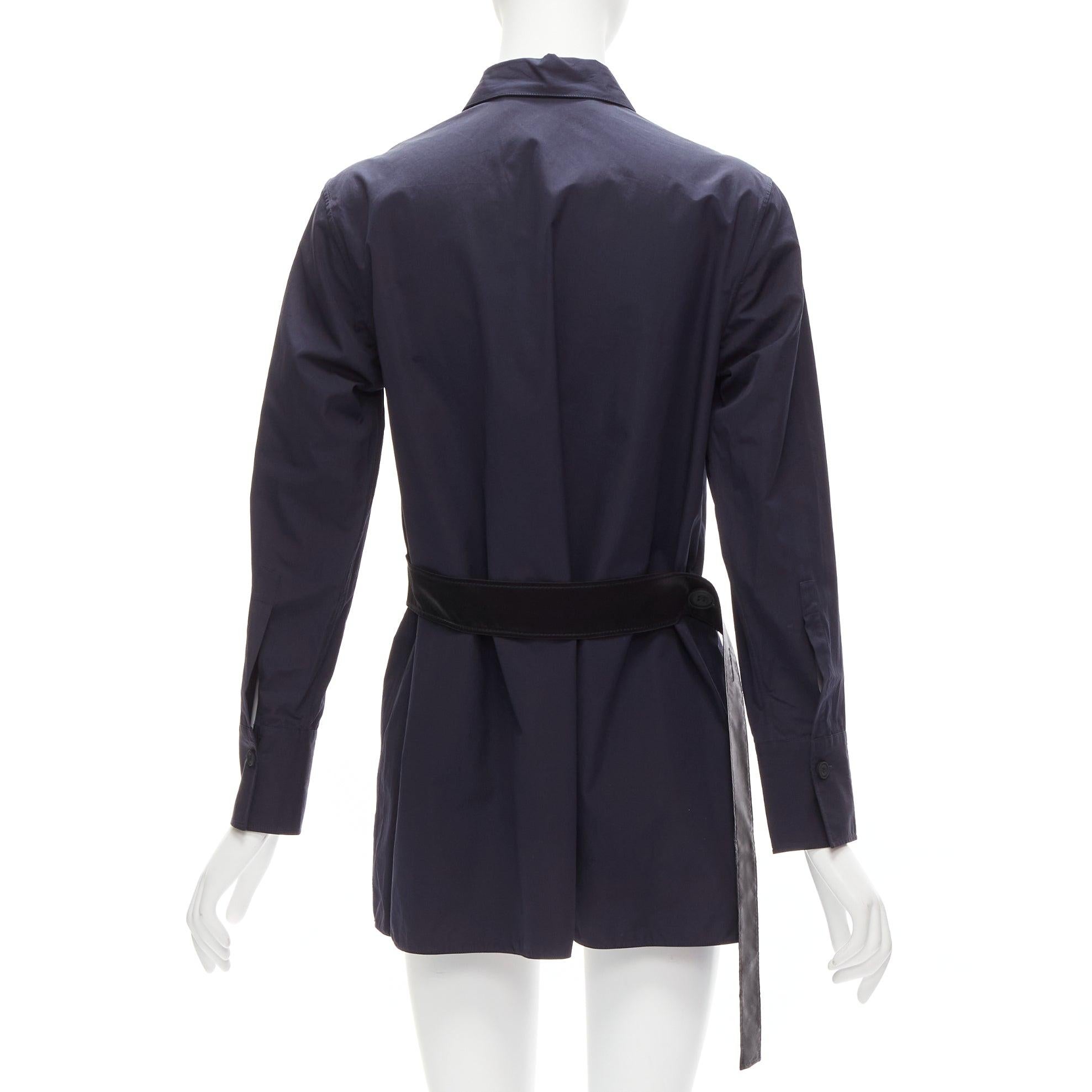 MARNI navy blue cotton rubber button asymmetric belted shirt IT38 XS
Reference: CELG/A00333
Brand: Marni
Material: Cotton
Color: Navy, Black
Pattern: Solid
Closure: Button
Extra Details: Rubber buttons and satin back belt design.
Made in: