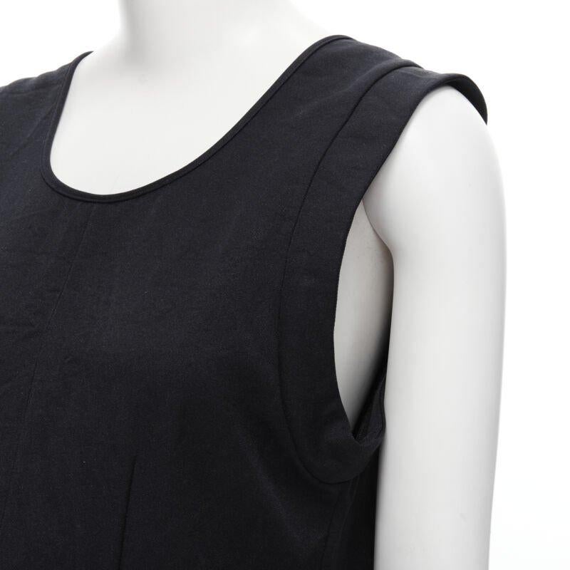MARNI navy blue crinkled scoop neck boxy dress IT42 S
Reference: CELG/A00117
Brand: Marni
Material: Polyester, Cotton
Color: Navy
Pattern: Solid
Closure: Zip
Extra Details: Scoop neck. Irregular dart at waist. Zip side closure.
Made in: