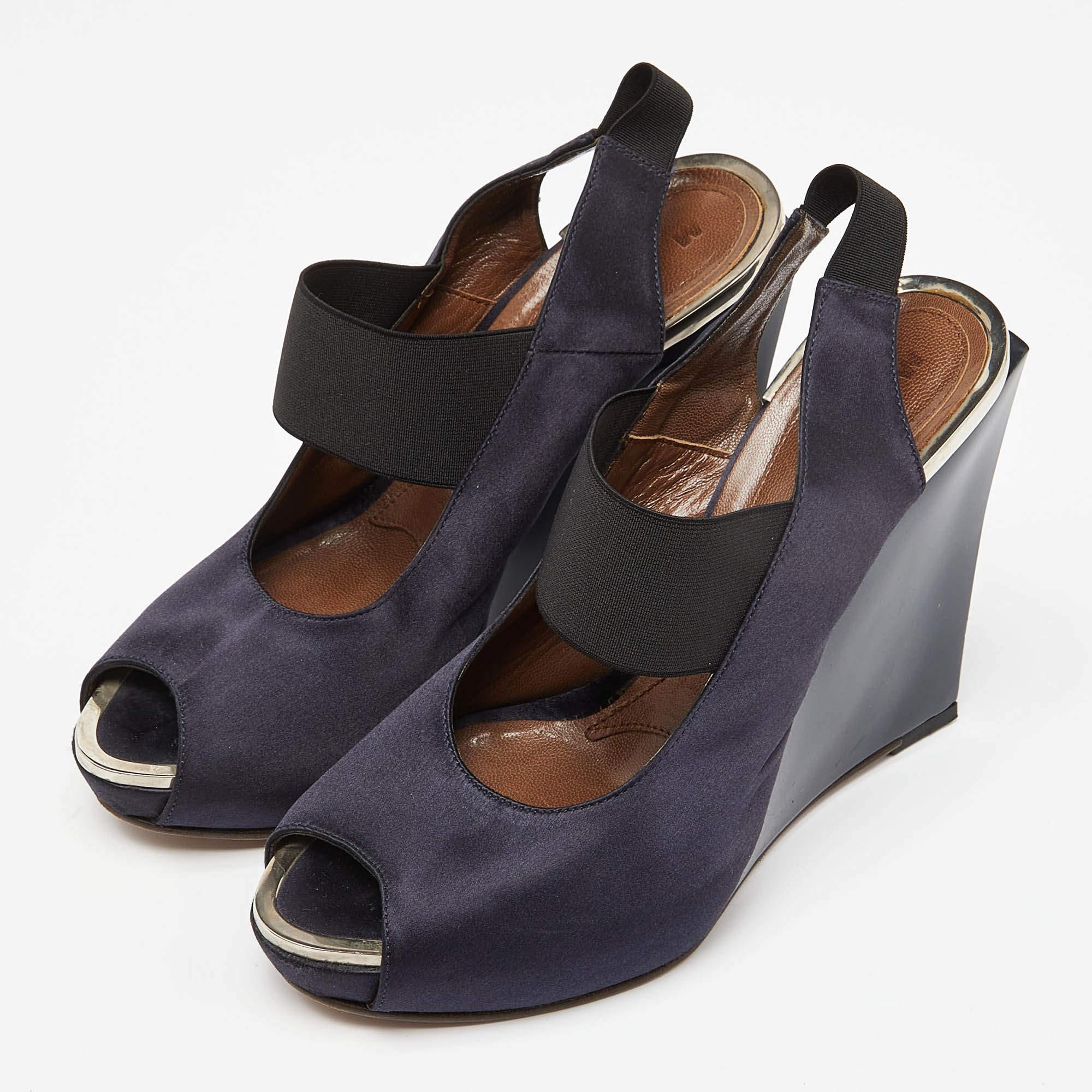Whether you're into high style comfort or both these lovely wedges will never disappoint. They feature a chic silhouette and an eye pleasing hue. Make this pair yours today
