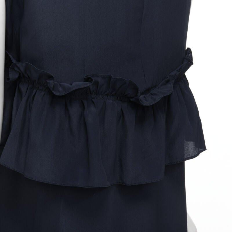 MARNI navy blue silk crepe cross ruffle trim knee lenth dress IT40 S
Reference: CELG/A00190
Brand: Marni
Material: Silk, Blend
Color: Navy
Pattern: Solid
Closure: Zip
Extra Details: Ruffle frill detailing. Dipped back.
Made in: